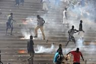 Football fans set fire to the stands at the Léopold Sédar Senghor stadium in Dakar on October 13